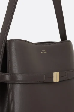 Women TOTEME Belted bucket bag in textured leather