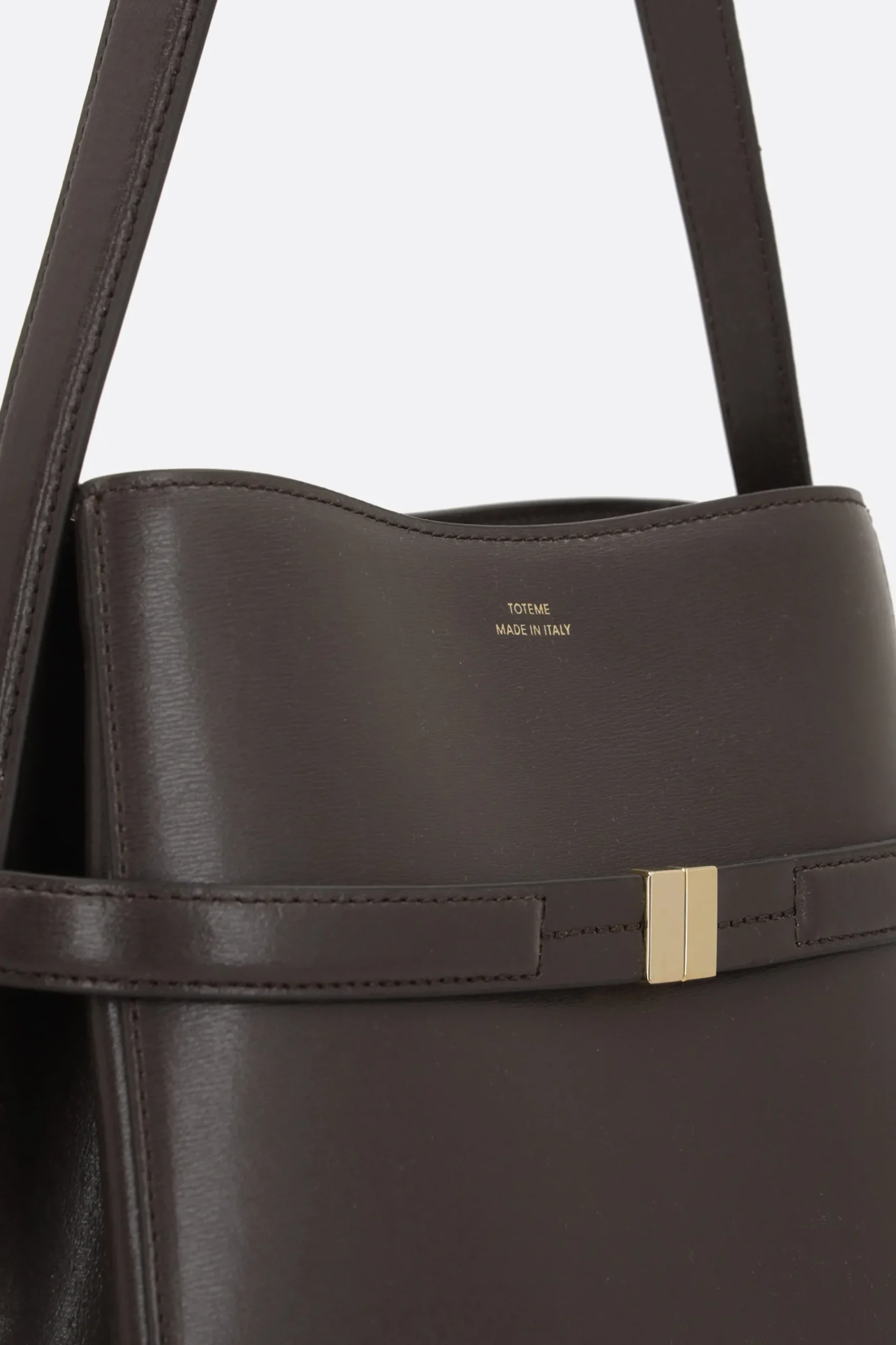 Women TOTEME Belted bucket bag in textured leather