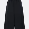 Women COMME DES GARÇONS COMME des GARÇONS crop trousers in lightweight pleated wool