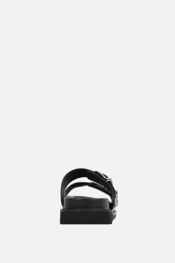 TOGA VIRILIS flat sandal in smooth leather with studs