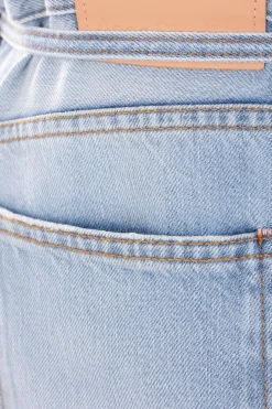 ACNE STUDIOS loose-fit denim jeans with thin belt