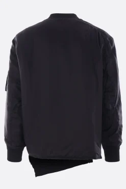 BLACK COMME des GARÇONS reversible asymmetrical bomber jacket.