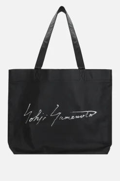 Women DISCORD YOHJI YAMAMOTO Signature large tote bag in grainy leather
