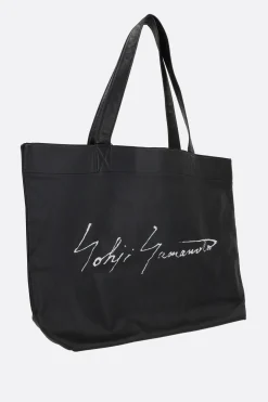 Women DISCORD YOHJI YAMAMOTO Signature large tote bag in grainy leather